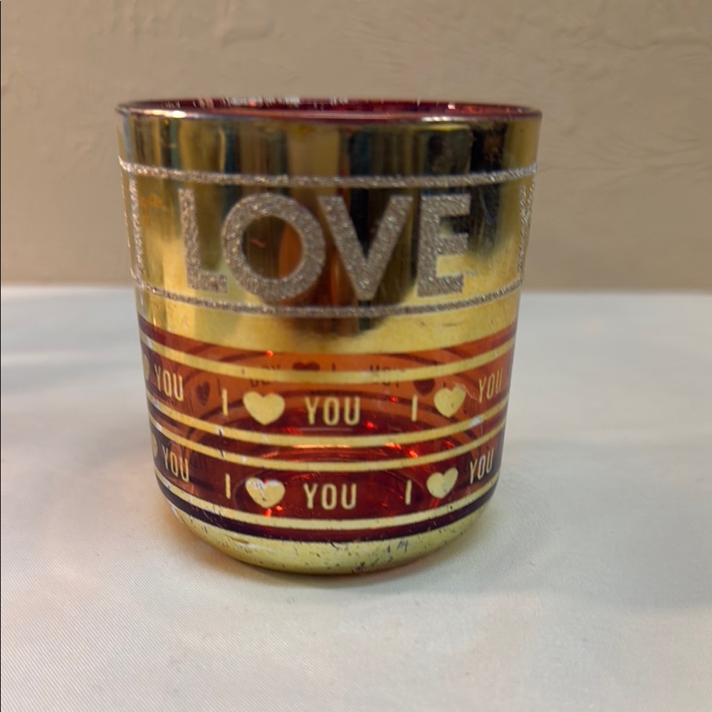 Love-Themed Gold and Red Candle Holder
